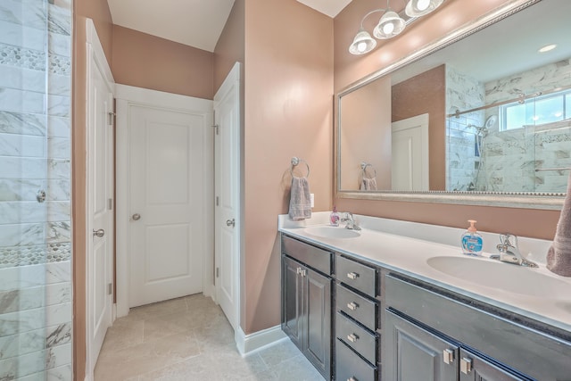 bathroom with vanity and a shower with shower door