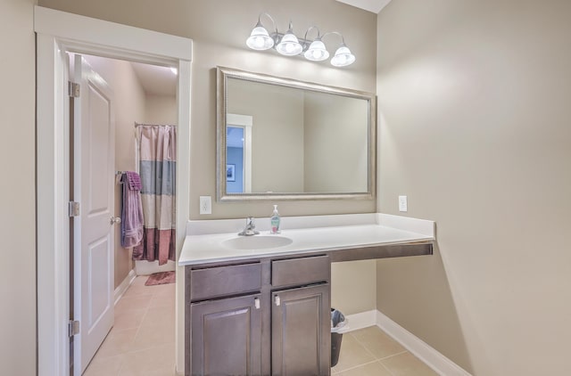 bathroom with tile patterned flooring and vanity