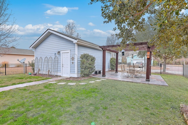 exterior space with an outdoor structure, a pergola, and a patio