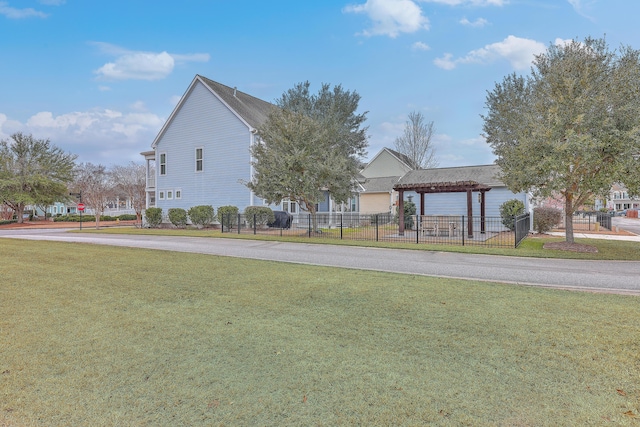 view of home's community with a yard and a gazebo