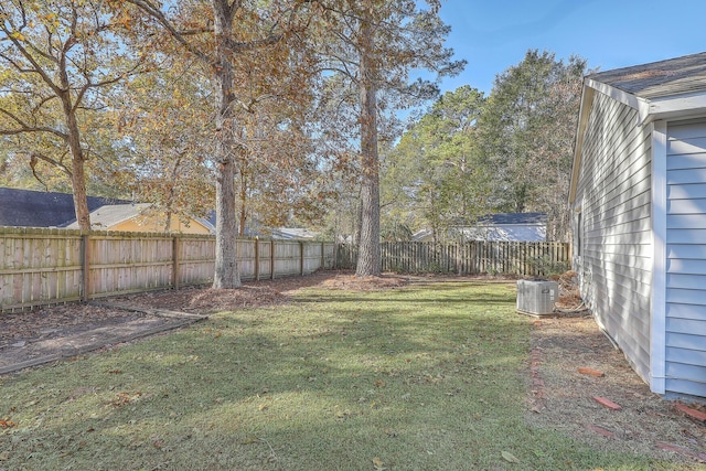 view of yard with central AC