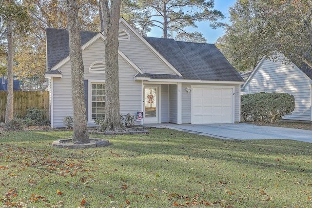 view of front of home featuring a garage and a front yard