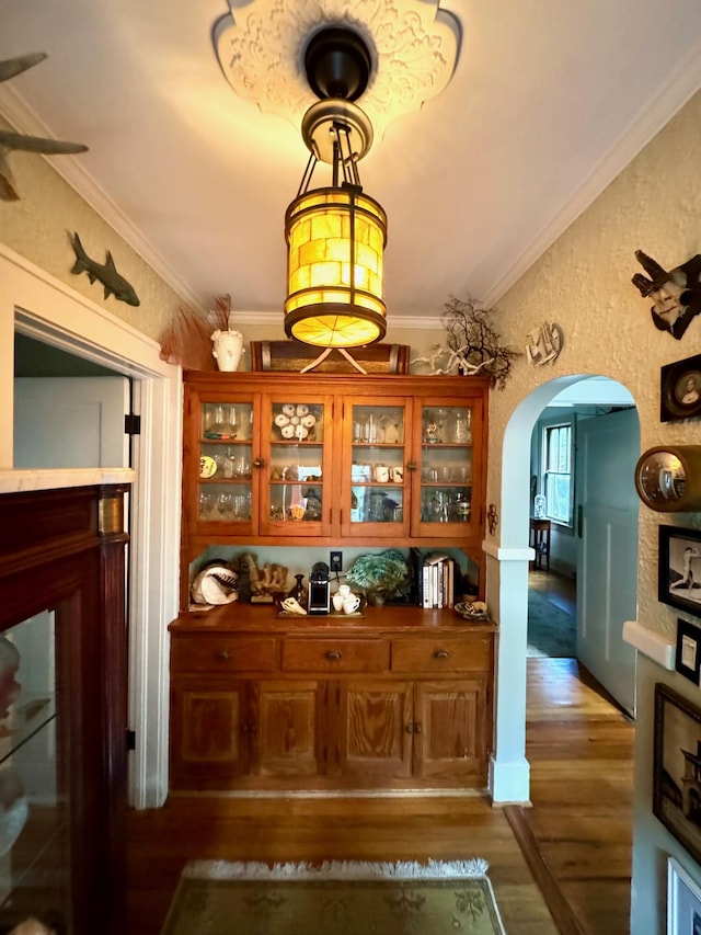 2066 Wappoo Dr, Charleston, SC 29412 - office with wood finished floors, arched walkways, and ornamental molding