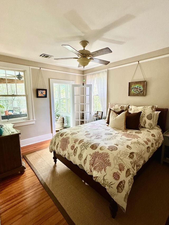 2066 Wappoo Dr, Charleston, SC 29412 - bedroom with wood finished floors and ceiling fan