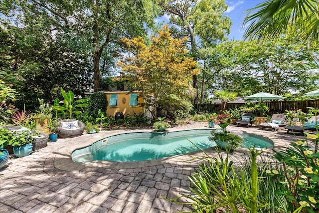 2066 Wappoo Dr, Charleston, SC 29412 - view of swimming pool with a fenced backyard, an outbuilding, and a patio