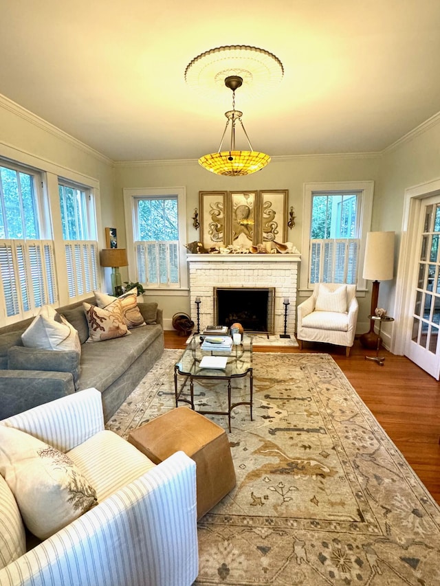 2066 Wappoo Dr, Charleston, SC 29412 - living room featuring wood finished floors, ornamental molding, and a fireplace
