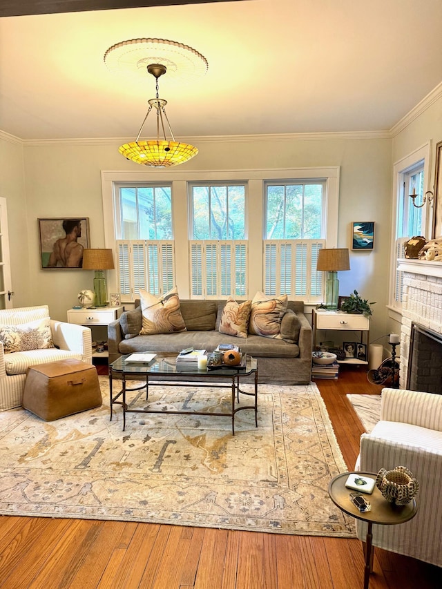 2066 Wappoo Dr, Charleston, SC 29412 - living room with crown molding, wood finished floors, and a fireplace