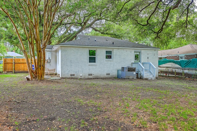 1188 Camden St, North Charleston, SC 29405 - rear view of house with crawl space and brick siding