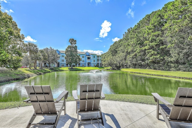 view of patio / terrace with a water view