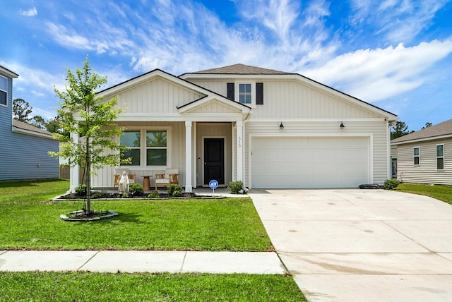 513 Donnas View Way, Summerville, SC 29486 - view of front facade featuring an attached garage, covered porch, a front yard, concrete driveway, and board and batten siding