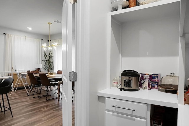 513 Donnas View Way, Summerville, SC 29486 - bar featuring wood finished floors, recessed lighting, and a chandelier