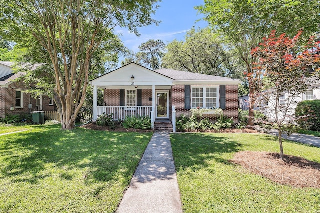 31 Lyttleton St, Charleston, SC 29407 - bungalow featuring covered porch, brick siding, a front lawn, and central AC