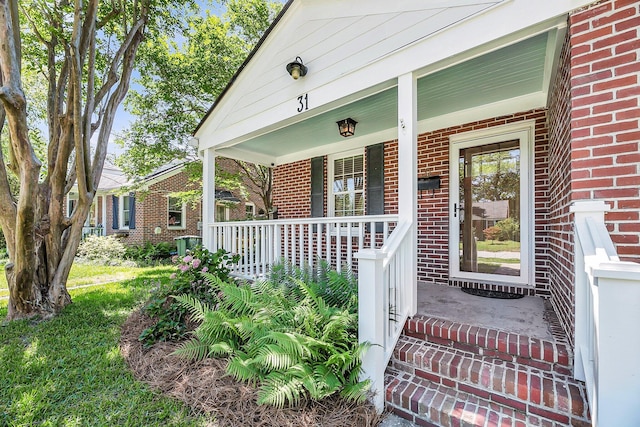 31 Lyttleton St, Charleston, SC 29407 - property entrance featuring covered porch and brick siding