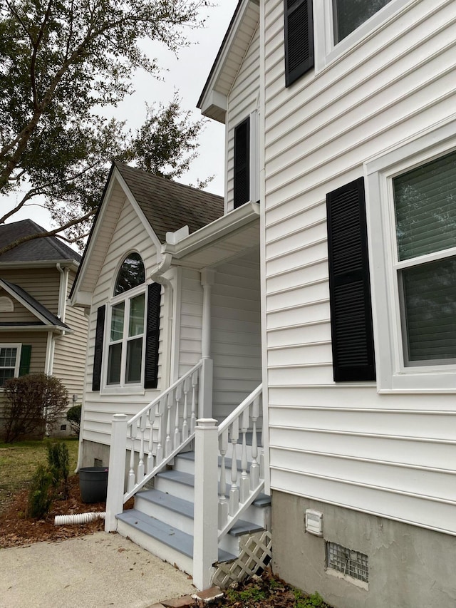 view of property exterior with crawl space