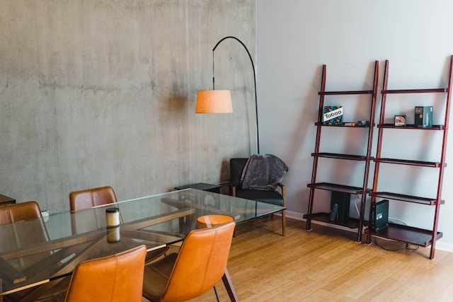 dining room with hardwood / wood-style flooring