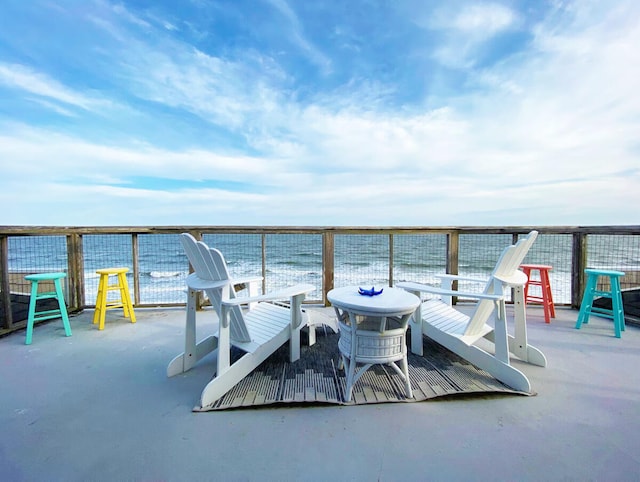 view of patio / terrace with a water view