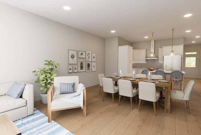 dining room featuring light hardwood / wood-style floors