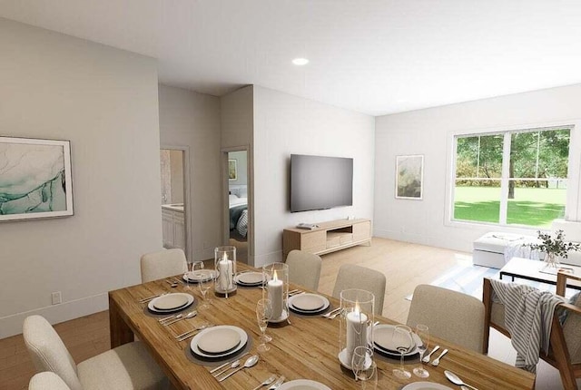 dining area with light wood-type flooring