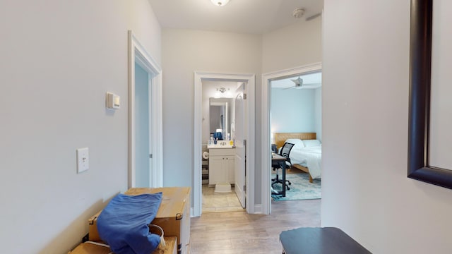 hall featuring light hardwood / wood-style flooring