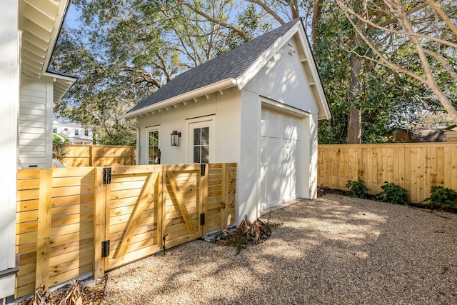 view of outbuilding with a garage