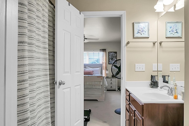 bathroom featuring vanity and ceiling fan