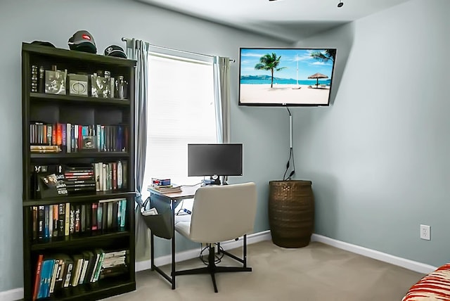 home office featuring carpet floors and baseboards