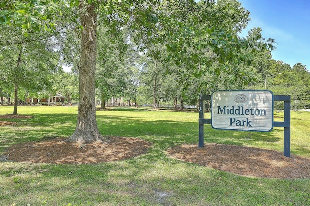 view of community featuring a lawn