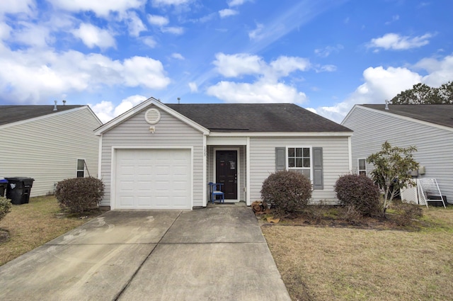 ranch-style home featuring a garage, a shingled roof, a front lawn, and concrete driveway