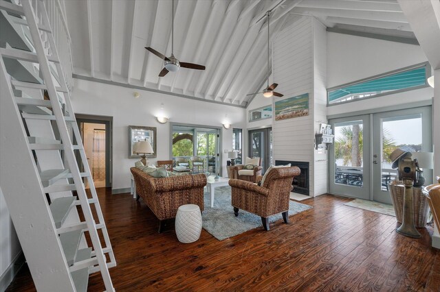 2619 Buccaneer Rd, Isle Of Palms, SC 29451 - living area with high vaulted ceiling, a ceiling fan, french doors, wood finished floors, and beam ceiling