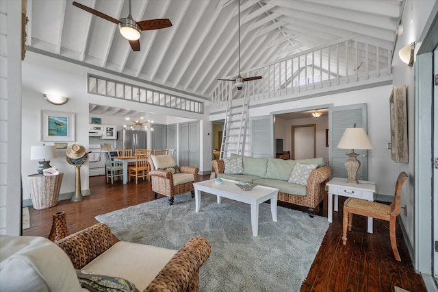 2619 Buccaneer Rd, Isle Of Palms, SC 29451 - living area featuring a ceiling fan, high vaulted ceiling, wood finished floors, a chandelier, and beam ceiling
