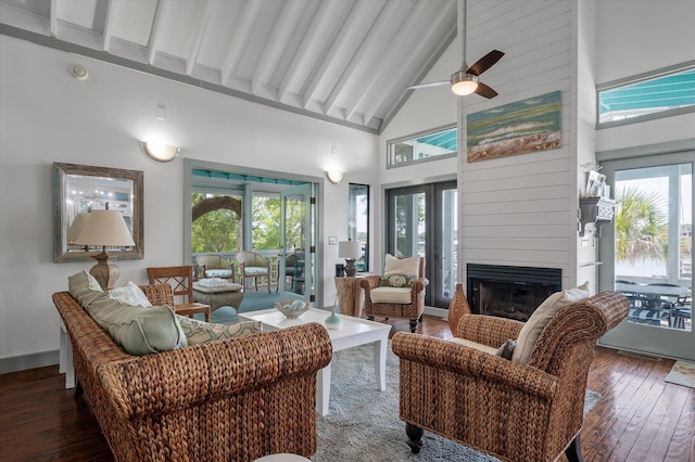 2619 Buccaneer Rd, Isle Of Palms, SC 29451 - living area with high vaulted ceiling, healthy amount of natural light, a large fireplace, hardwood / wood-style floors, and beam ceiling