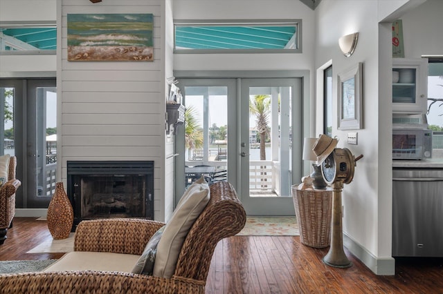 2619 Buccaneer Rd, Isle Of Palms, SC 29451 - entrance foyer with wood-type flooring, healthy amount of natural light, and french doors
