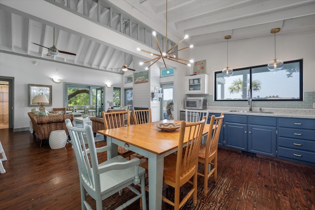 2619 Buccaneer Rd, Isle Of Palms, SC 29451 - dining space with dark wood-type flooring and a ceiling fan