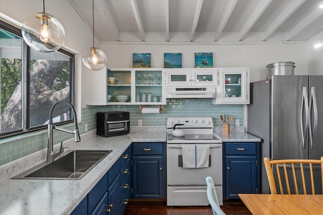 2619 Buccaneer Rd, Isle Of Palms, SC 29451 - kitchen featuring electric stove, freestanding refrigerator, a sink, under cabinet range hood, and blue cabinetry