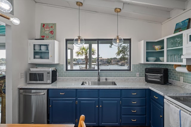 2619 Buccaneer Rd, Isle Of Palms, SC 29451 - kitchen with a sink, blue cabinets, open shelves, and white microwave
