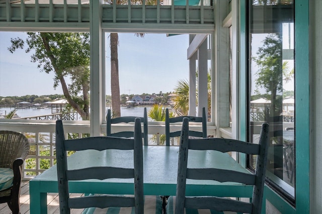 2619 Buccaneer Rd, Isle Of Palms, SC 29451 - dining area featuring a water view and healthy amount of natural light