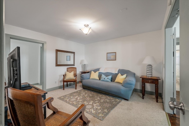 2619 Buccaneer Rd, Isle Of Palms, SC 29451 - carpeted living area featuring baseboards