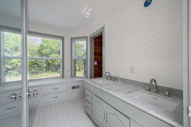 2619 Buccaneer Rd, Isle Of Palms, SC 29451 - bathroom featuring tile patterned floors and double vanity