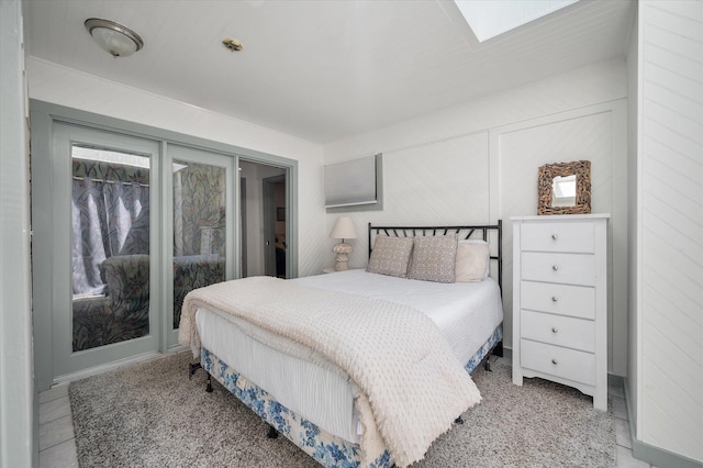 2619 Buccaneer Rd, Isle Of Palms, SC 29451 - bedroom with a skylight and access to outside