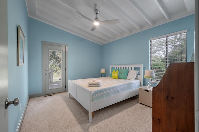 2619 Buccaneer Rd, Isle Of Palms, SC 29451 - carpeted bedroom featuring multiple windows, access to exterior, a ceiling fan, and baseboards