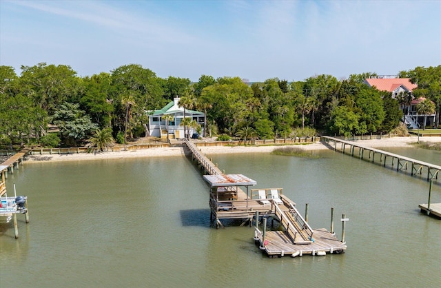 2619 Buccaneer Rd, Isle Of Palms, SC 29451 - dock area with a water view and view of wooded area