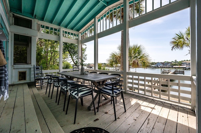 2619 Buccaneer Rd, Isle Of Palms, SC 29451 - sunroom / solarium with a water view, healthy amount of natural light, outdoor dining area, and lofted ceiling