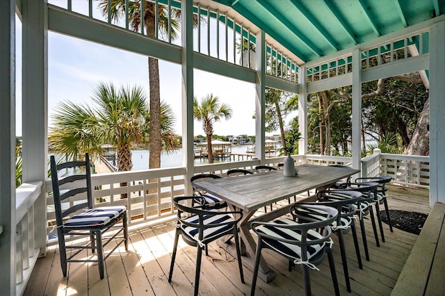 2619 Buccaneer Rd, Isle Of Palms, SC 29451 - sunroom featuring a water view and vaulted ceiling