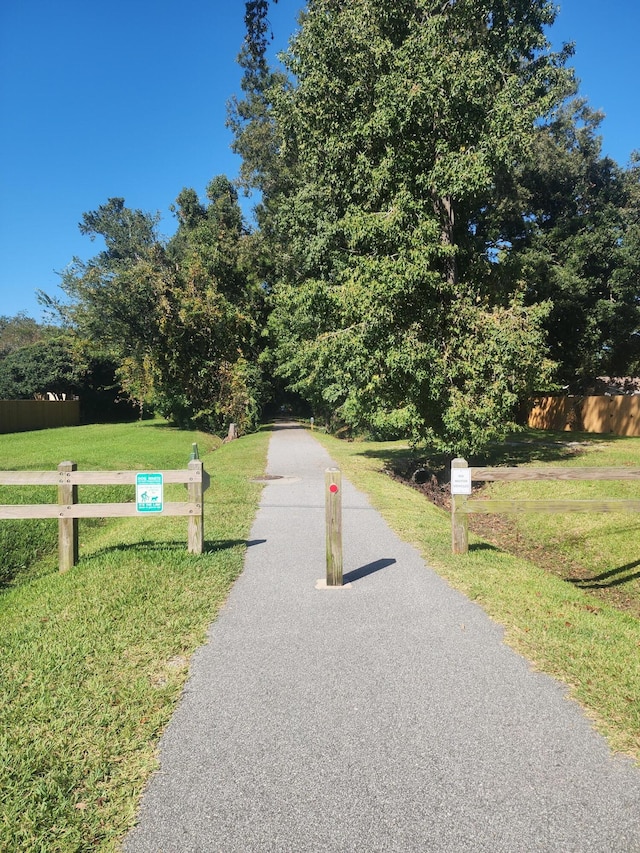 surrounding community featuring a lawn