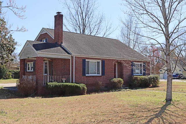 5286 Cameron Rd, Cameron, SC 29030 - view of front of property with a shingled roof, brick siding, a chimney, and a front lawn