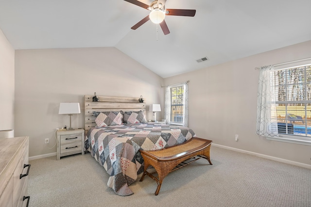 carpeted bedroom featuring lofted ceiling and ceiling fan