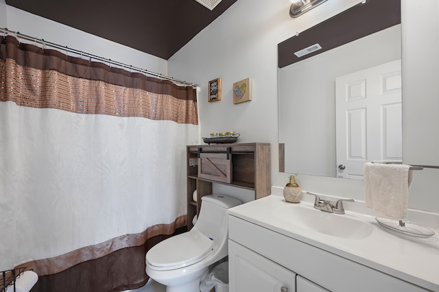 bathroom featuring a shower with curtain, vanity, and toilet