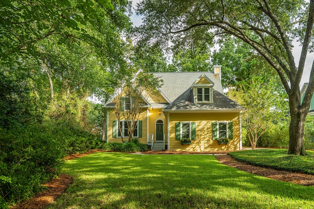 view of front of house with a front lawn