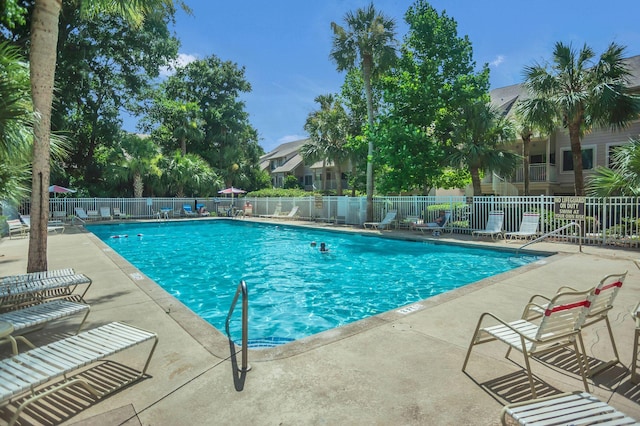 view of swimming pool featuring a patio area