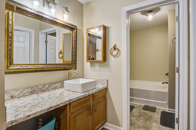 7896 Montview Rd, North Charleston, SC 29418 - bathroom featuring vanity, a bathtub, and baseboards